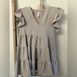 Loose fit, tan blouse size small